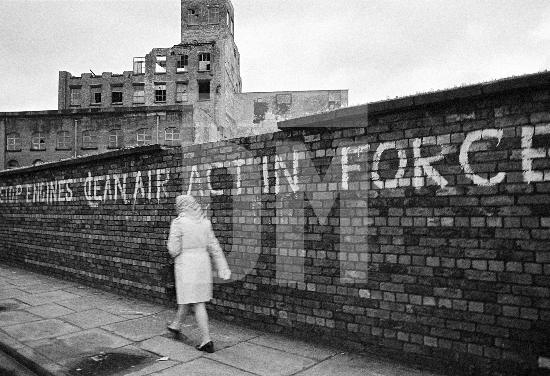 ‘Stop Engines Clean Air Act In Force, Stockport. February 1977 by Daniel Meadows