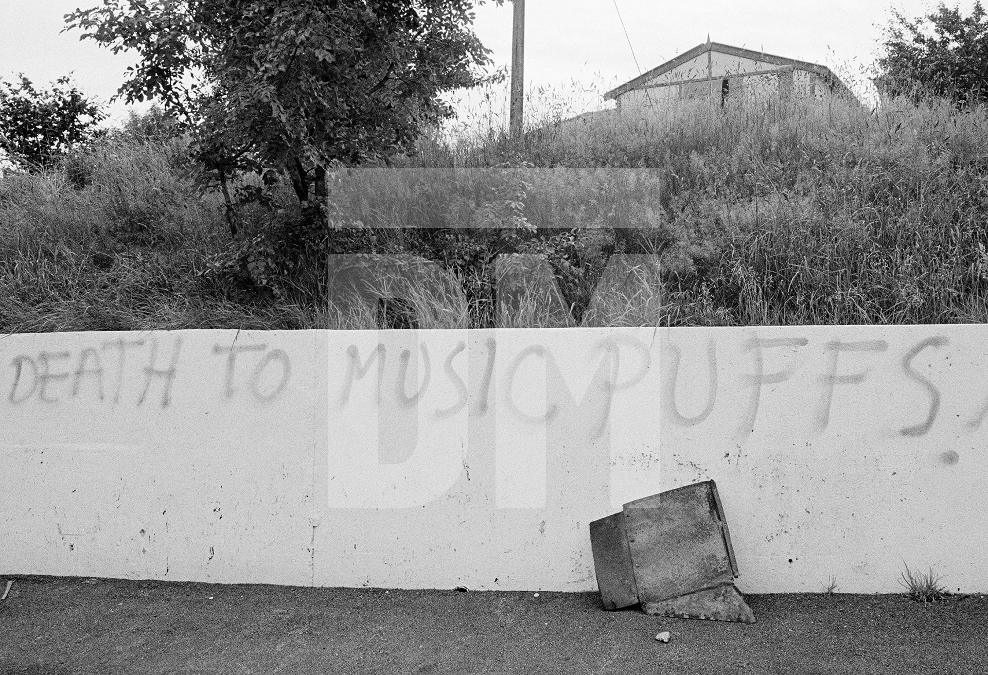 ‘Death to music puffs’, Burnley. August 1980 by Daniel Meadows