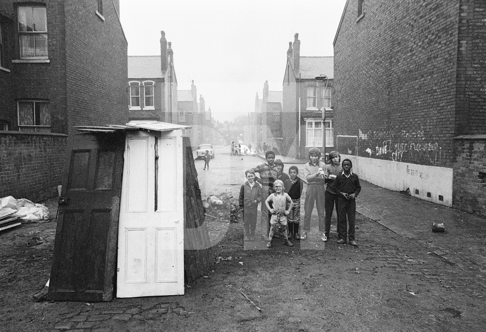 Bonfire night, Moss Side, Manchester. November 1972 by Daniel Meadows