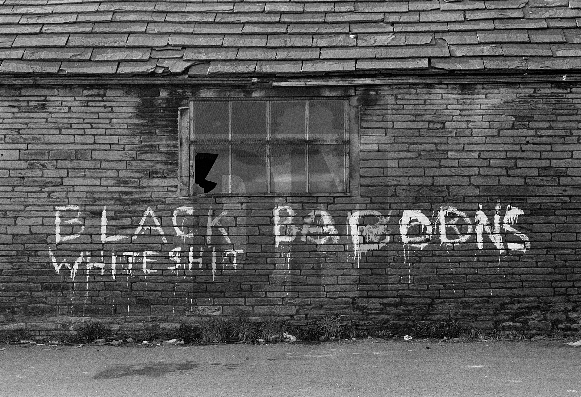 ‘Black white shit baboons’, Blackburn. April 1978 by Daniel Meadows