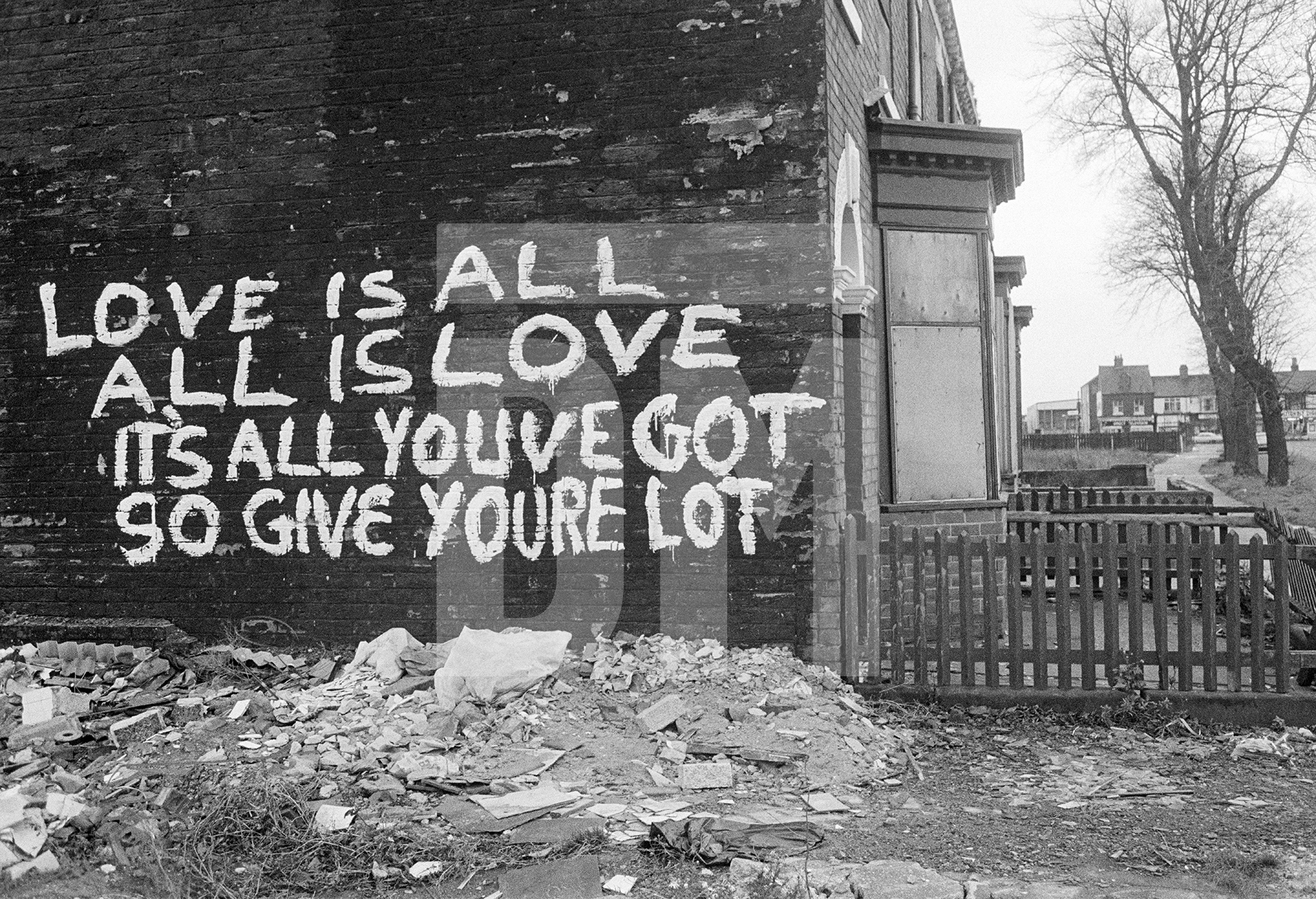 ‘Love is all, all is love, it’s all youve got so give youre lot’, Hull. November 1982 by Daniel Meadows