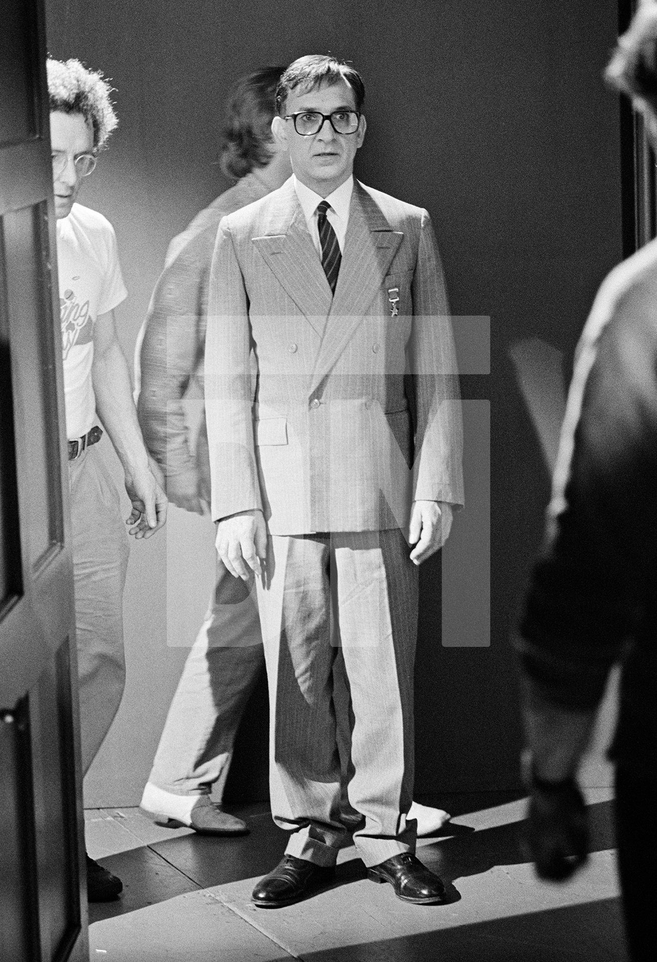 Ben Kingsley [Dmitri Shostakovich]. Setting up the shot, director of photography Nic Knowland at left. Location: Alhambra Theatre, Bradford. February 1987 by Daniel Meadows