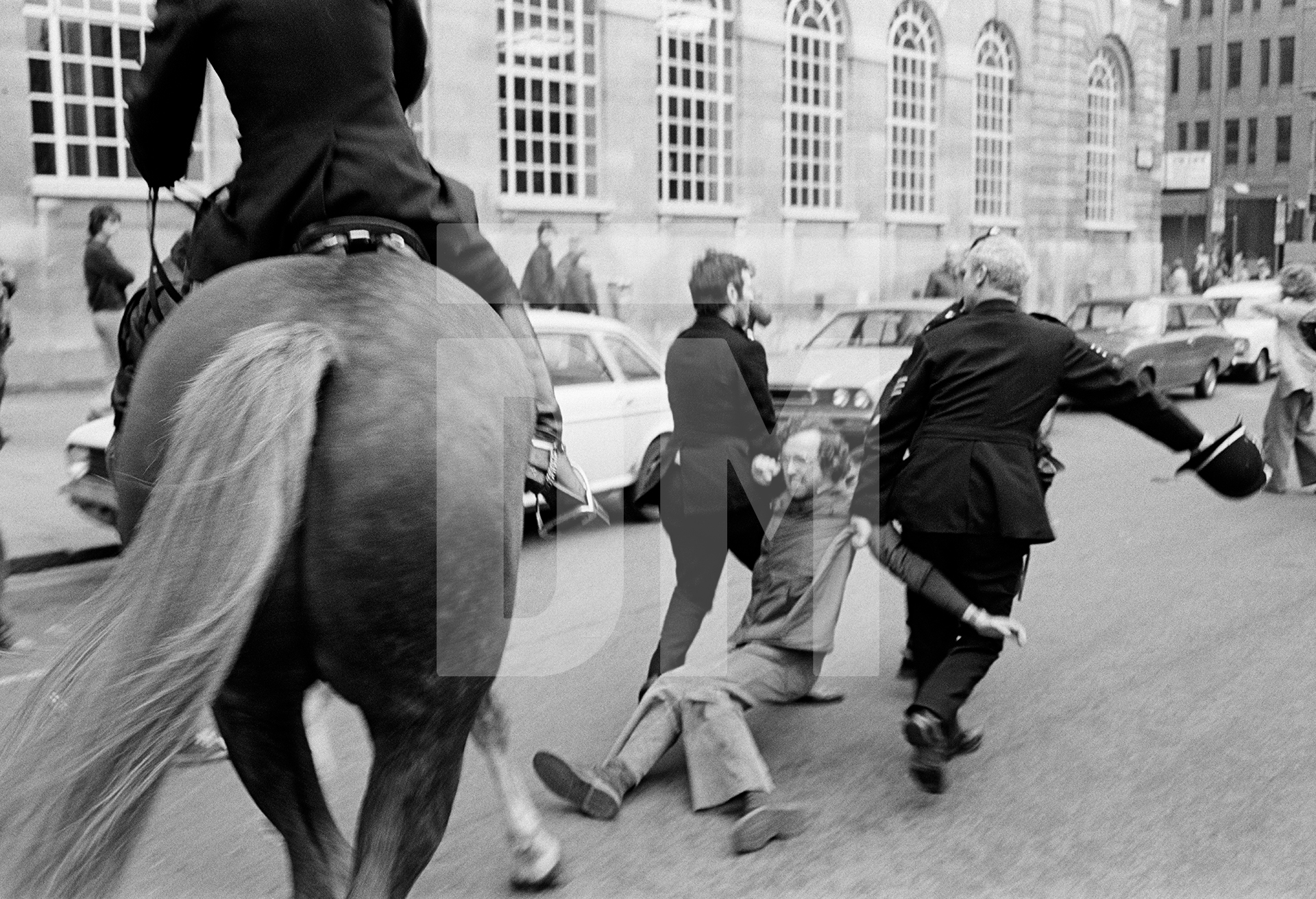 Anti Nazi League (ANL) demonstration against a National Front (NF) meeting. A demonstrator is arrested, Leeds. April 1978 by Daniel Meadows