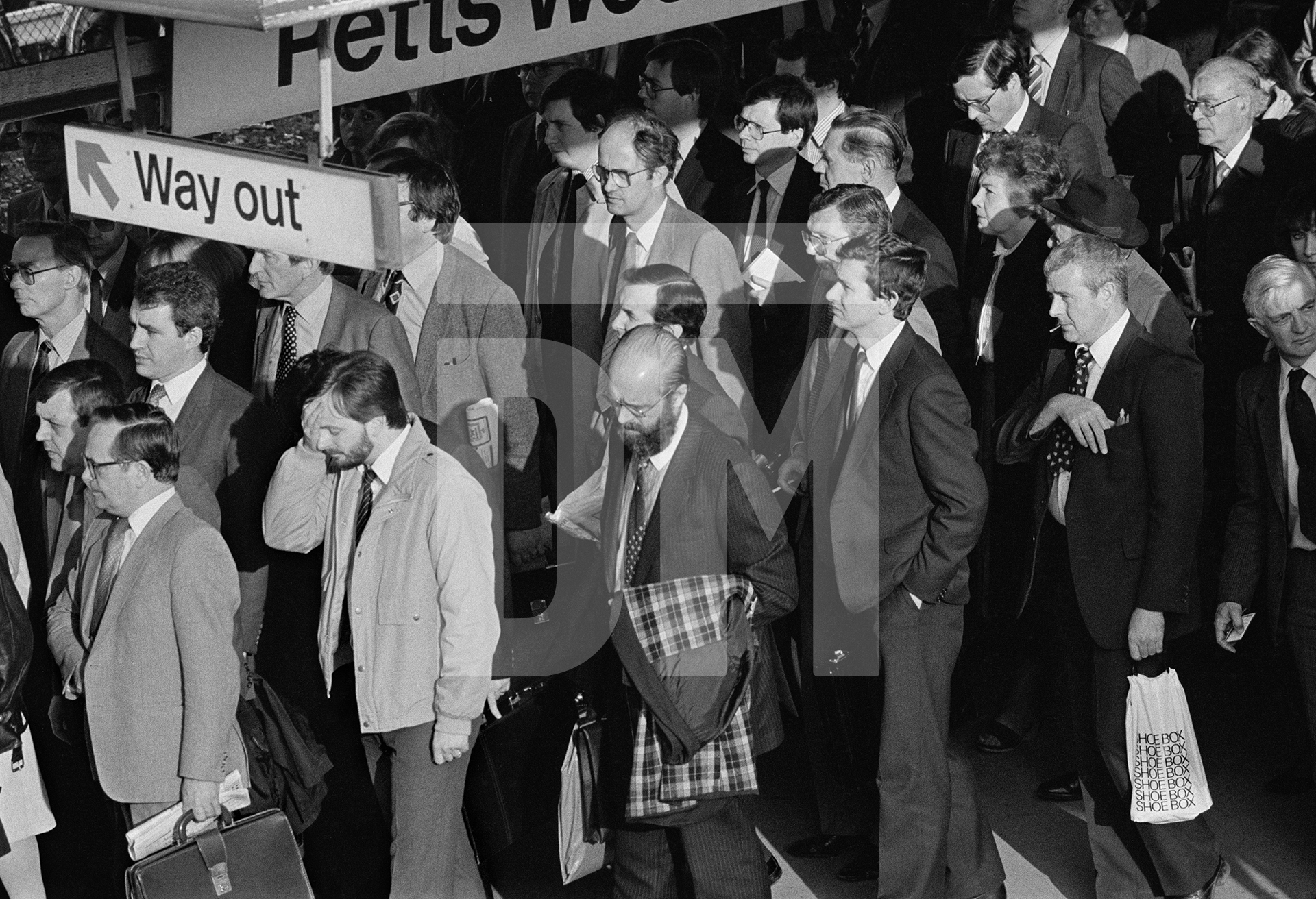 Commuters on the way home, Petts Wood station. April 1985 by Daniel Meadows