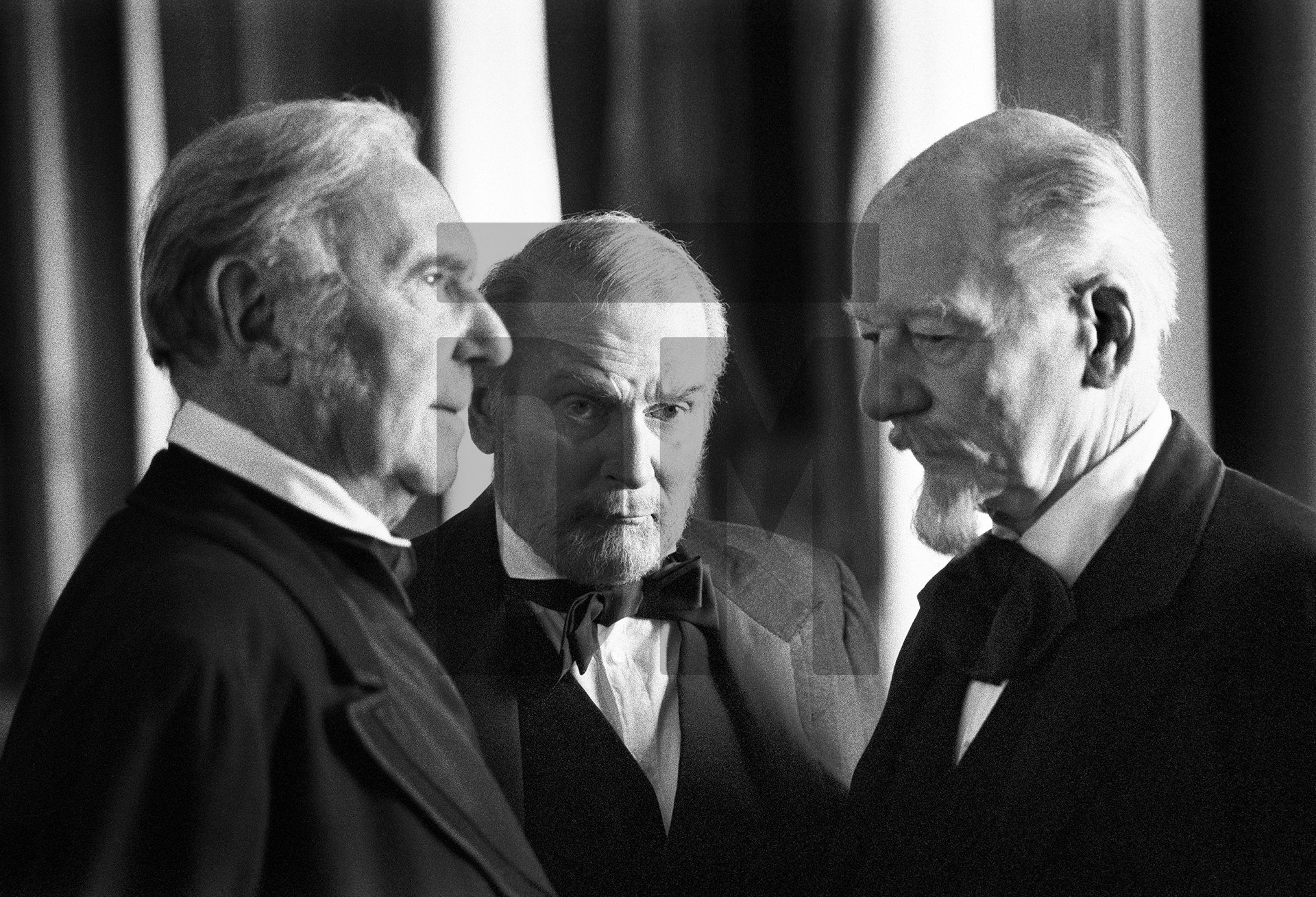 Sir Ralph Richardson [Pfordten], Lord Olivier [Pfeufer], Sir John Gielgud [Pfistermeister] officials at the court of ‘mad’ King Ludwig II of Bavaria, on set at the Hofburg Palace, Vienna. January 1982 by Daniel Meadows