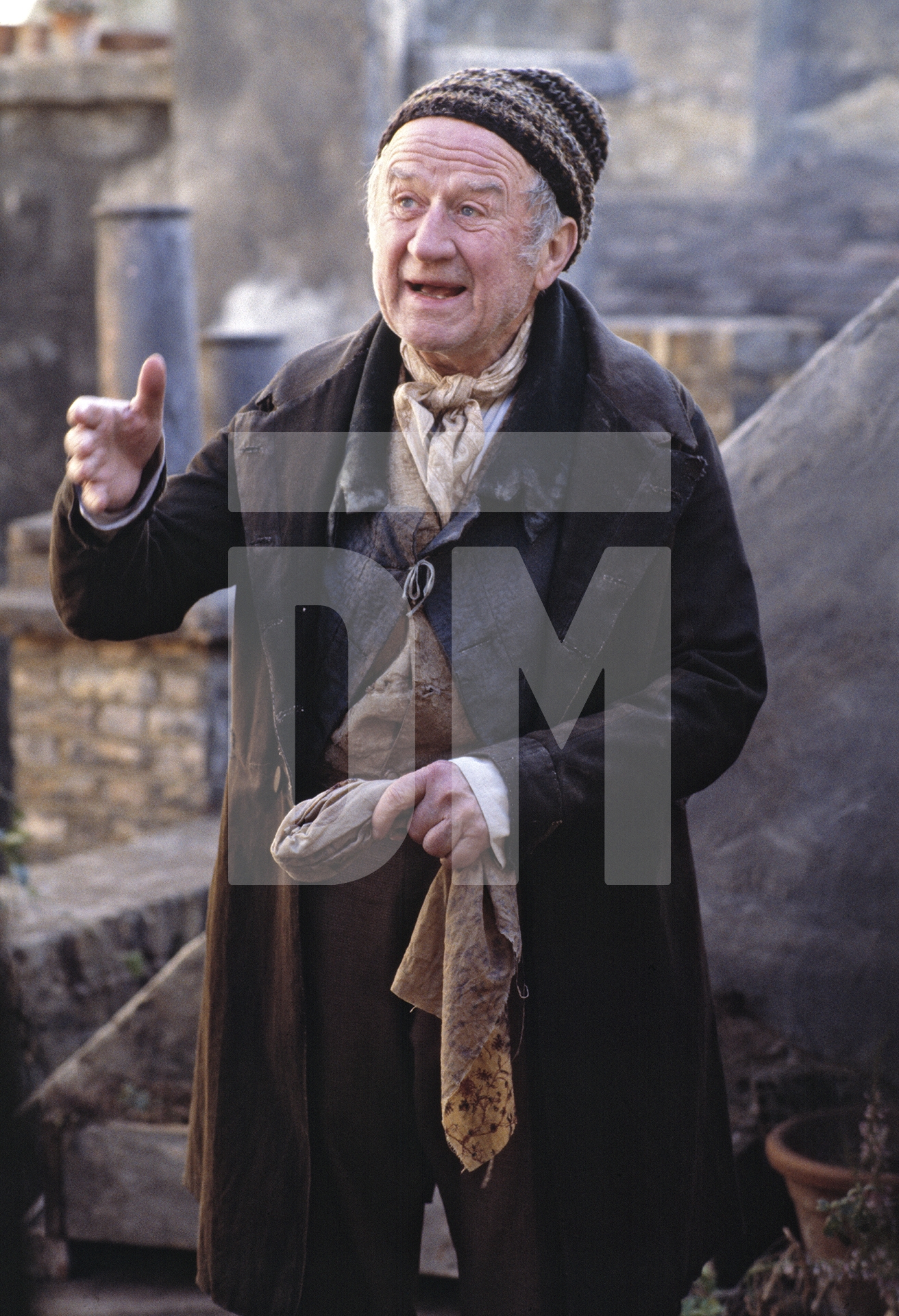 Cyril Cusack [Ballad Seller] in ‘The Fool’. Sands Films, Rotherhithe. London, 1990 by Daniel Meadows