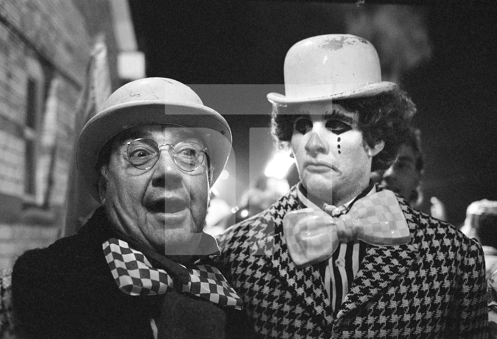 Comedians Frank Carson and Chris Barry at the Night Carnival Of The Dead. Location: Lakeside and Haverthwaite Railway, Windermere. February 1987 by Daniel Meadows